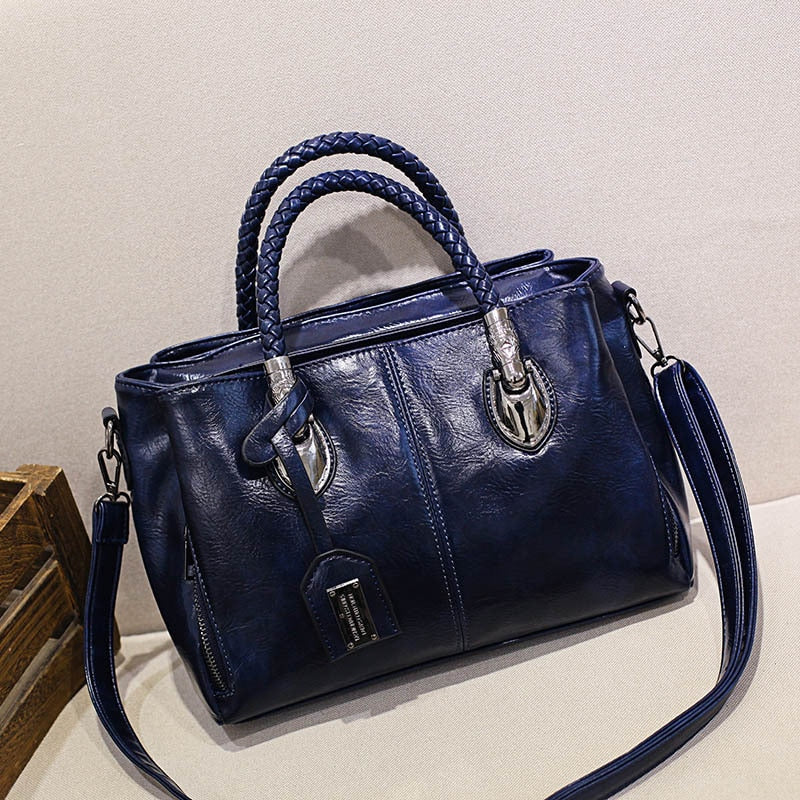 Bolsa Feminina Clássica Boston™ - Dupla Alça em Couro PU