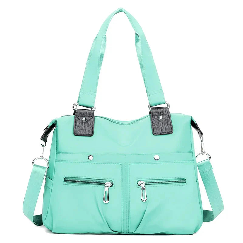 Bolsa Feminina Impermeável Myla + Brinde Exclusivo