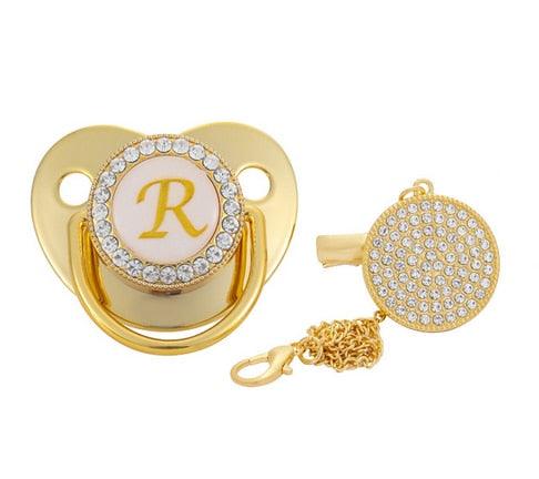 Chupeta Ouro Bling com a Letra Inicial do Seu Bebê - Lojas Promorin